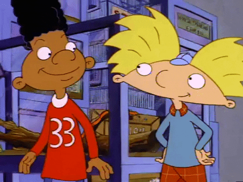 Arnold and Gerald doing their best friend handshake from the show "Hey Arnold!"