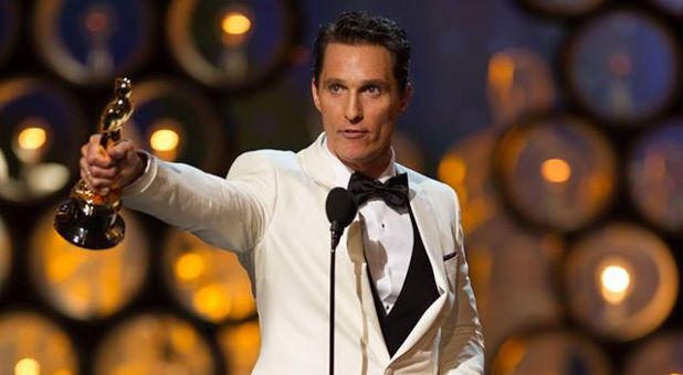 Matthew McConaughey picking up the Academy Award (Oscar)