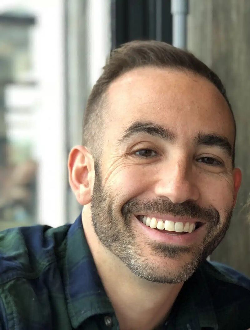 Smiling photo of male bootcamp graduate
