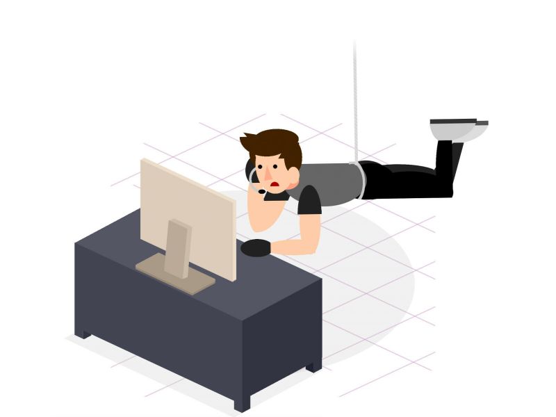 Cartoon parodying Mission:Impossible with a man hanging from a rope in front of a computer