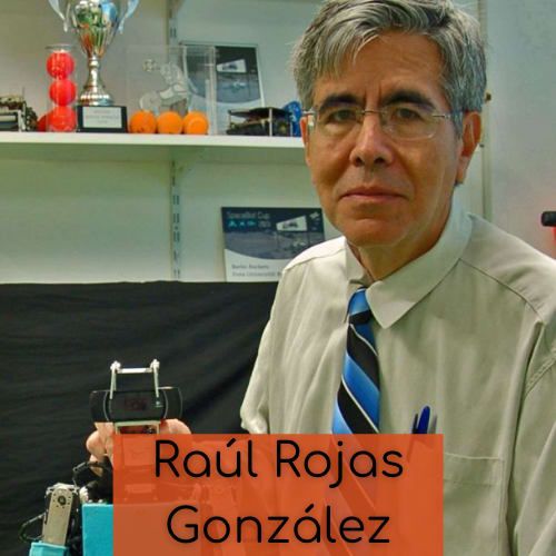 Photo of Raúl Rojas González, a hispanic computer scientist standing next to one of his robots