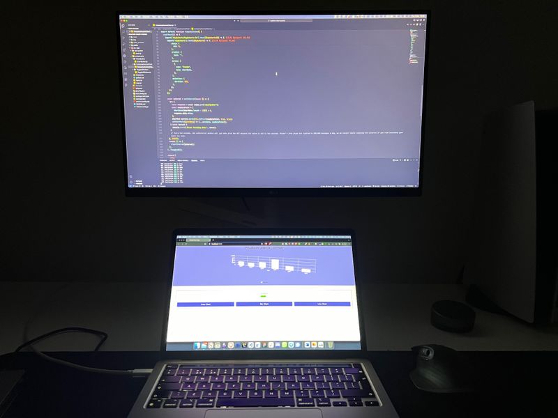 Room with lights off and monitor with no BenQ ScreenBar attached